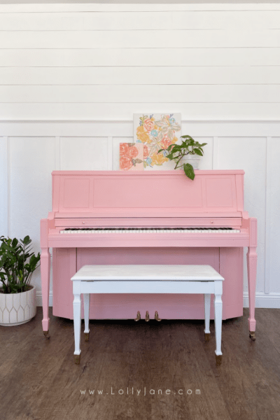 An easy piano painting tutorial. Transform your piano in an afternoon with some paint and a $5 brush! #howtopaintpiano #paintedpiano #paintedpianotutorial #pinkpiano #paintedpianoidea