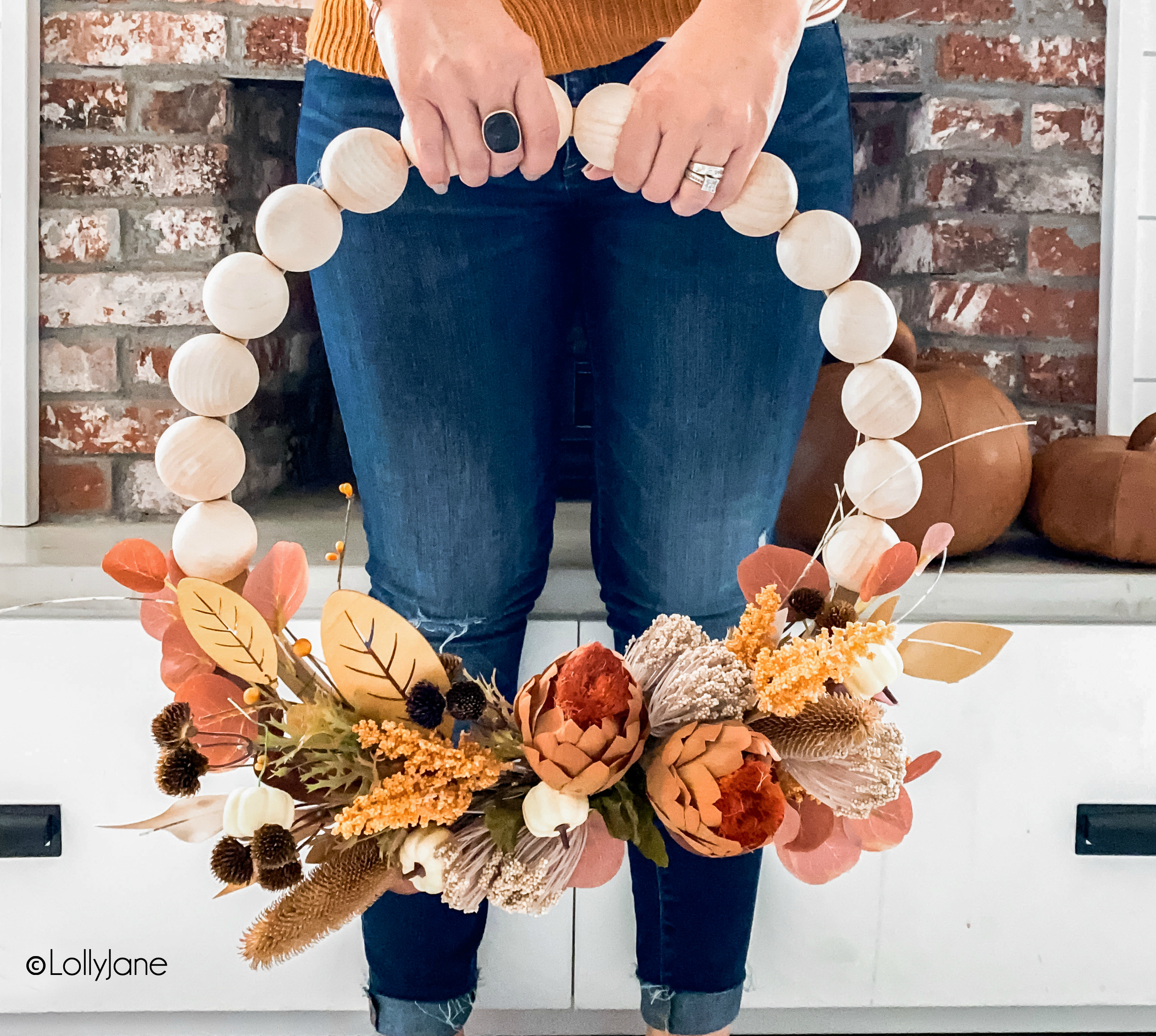 DIY Fall Split Bead Wreath, SO easy to make and super cute for ANY holiday-- just swap out the colors and elements! #woodbead #woodbeads #splitwoodbead #splitbead #beadwreath #diywreath #wreaths #fallwreath #handmade