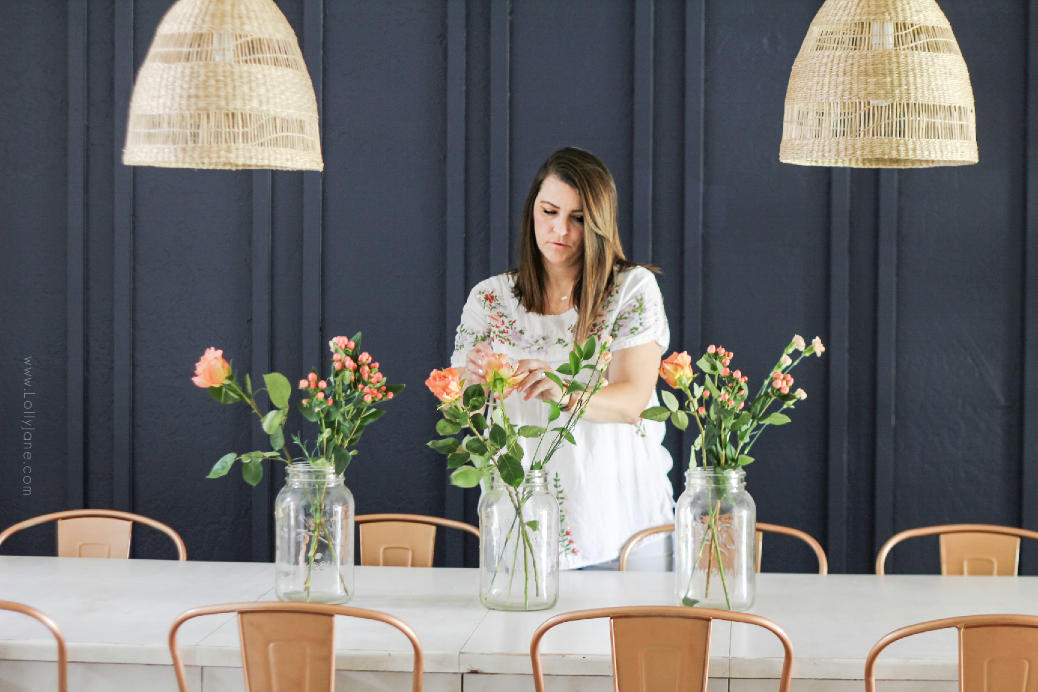 This affordable dining room boho style from farmhouse style has been a fan favorite! From faux wallpaper to navy double batten walls, this room went from comfortable to chic for less than $300! #diningroombohostyle #bohostylediningroom #affordablediningroommakeover #bohofarmhouse #bohostyledecor 