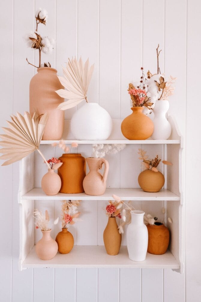 This baking soda paint vase tutorial is trending so hard right now! If you're wondering how to paint a vase with baking soda and paint, you'll love baking soda painted pumpkins, so cute! Such a fun and creative way to paint pumpkins that last all season long! #paintedpumpkins #howtopaintpumpkins #paintedpumpkins #pumpkinpaint #bakingsodapaint #howmuchbakingsodatoaddtopaint #bakingsodapainttrend