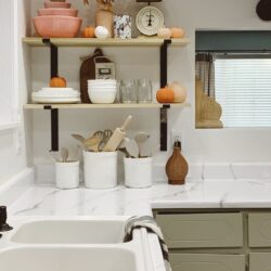 DIY Open Kitchen Shelves | Easy open kitchen shelves that totally changed this room! You've GOT to see the 40 year old kitchen and how we updated it for a few hundred bucks with epoxy countertops and open kitchen shelving!! Loving these open kitchen shelves! #openkitchenshelves #diyshelves #howtohangsheleves #openkitchenshelves #openkitchenshelving #openkitchenideas #howtostylekitchenshelves #falldecorating #fallkitchenshelves