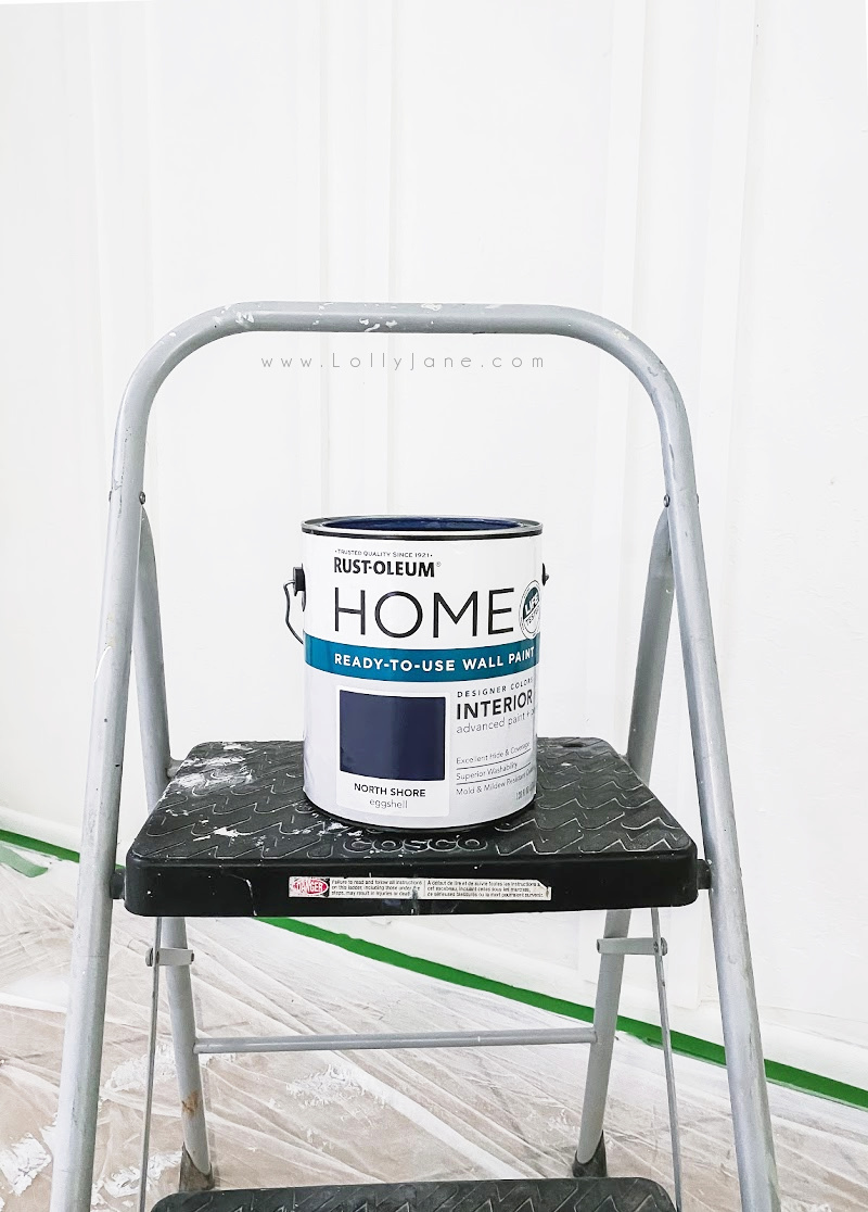 Loving this gorgeous shade of navy wall paint! Rustoleum North Shore navy paint goes on smooth and has a buttery soft finish. Come learn how to spray it on for a smooth finish! #rustoleumnorthshore #navybluewallpaint #navydiningroomwall #navydiningroom #navywallpaint #navywallpaintideas #navydiningroomwallideas