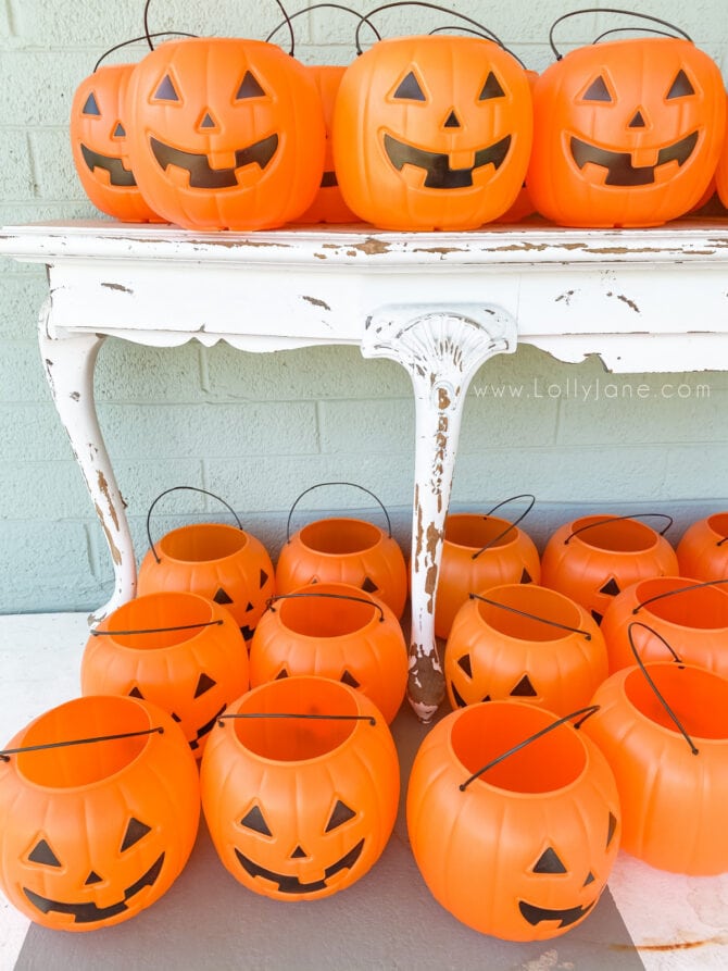 These are the best outdoor Halloween plastic pumpkins for decor. They're super cheap ($1/each!), durable, last for years and are the perfect size to fully decorate your whole porch! #halloweendecor #outdoorhalloweendecor #outsidedecorhalloween #halloweendecorationsoutdoors #halloweenporchdecor #halloweenporchdecorations