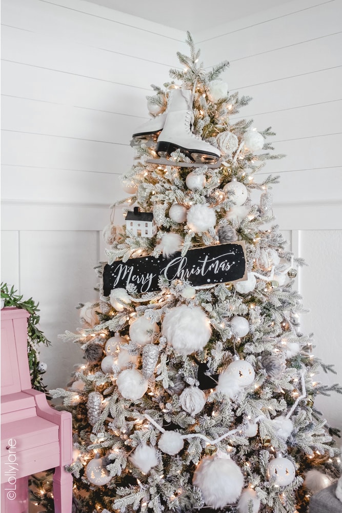 Turn a flocked tree into a winter wonderland with a handful of items that you may already have lying around the house! #Christmas #christmasdecor #christmasdecorations #iceskates #ChristmasTree #ChristmasTreeTheme #whiteblackchristmastree #christmastreetheme 