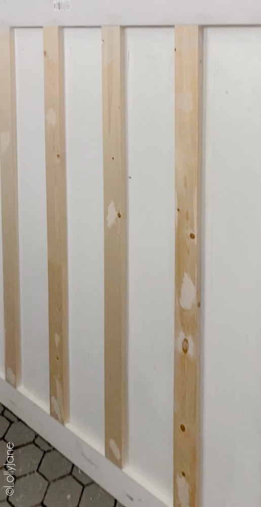 Transform a flat wall in day with this easy DIY Board and Batten wall treatment. Can be done without using powertools! Materials to build your own EASY Board and Batten Accent Wall! Transform a wall in no time! #boardandbatten #boardbatten #diy #accentwall #woodoworking