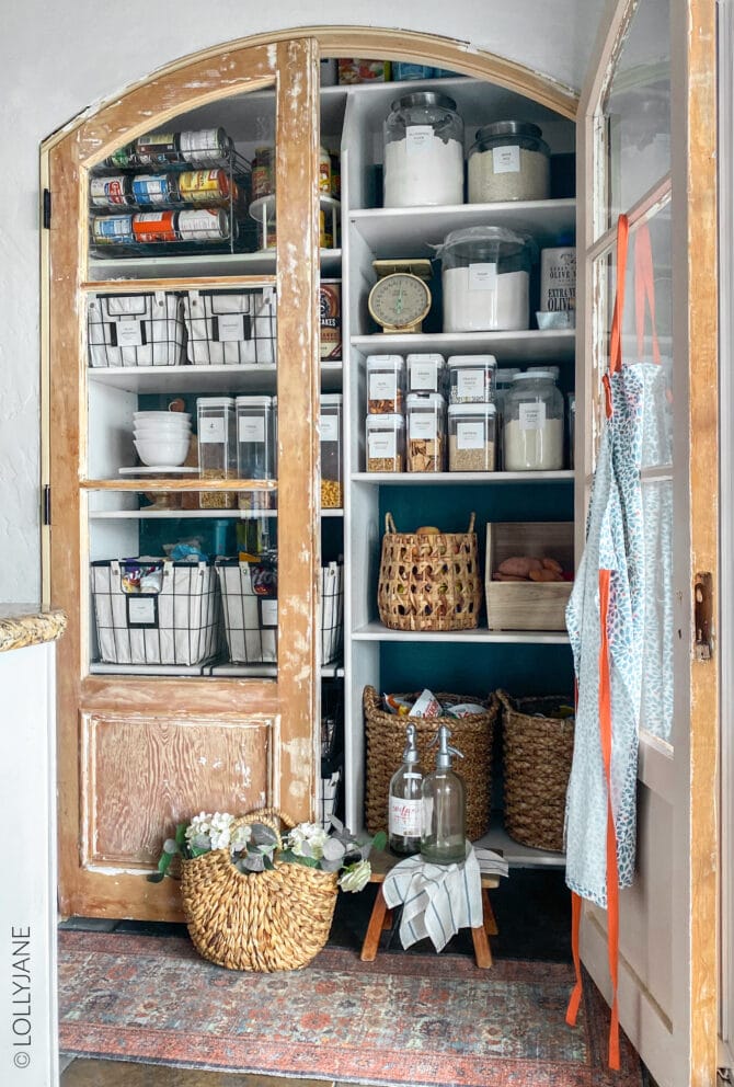 Give your pantry a makeover with some a splash of color on the wall + coordinating containers! SO easy to get this look and even easier to maintain! #pantry #pantrymakeover #pantryrefresh #pantryorganization #organization #homeorganization