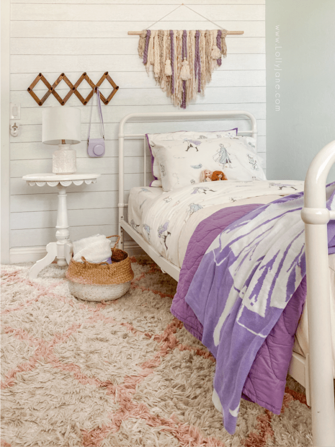 This Frozen 2 themed bedroom is so cute! It's got a boho style so it's not too juvenile for the youngest Frozen fans! Grab these tips to make your daughter's Frozen 2 dream bedroom come true!