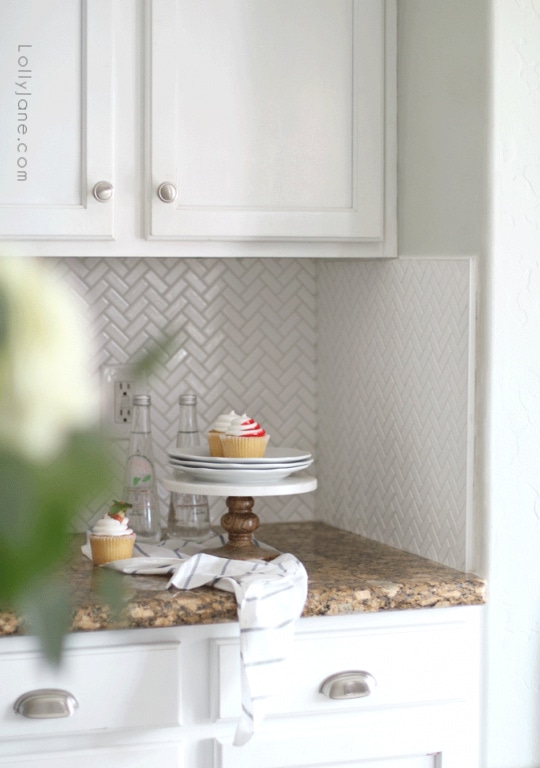 If you’re looking for a way to update your kitchen without a full remodel, consider tiling a herringbone backsplash. We love our mini herringbone tiles for visual interest and easy cleaning.