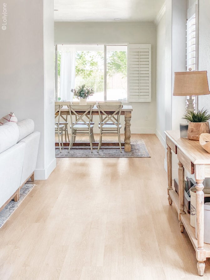 Stunning Luxury Vinyl Plank Flooring, so warm and inviting (looks JUST like real hardwood floor but without the maintenance!) in this cozy craftsman style home! Love the warm oak finish!