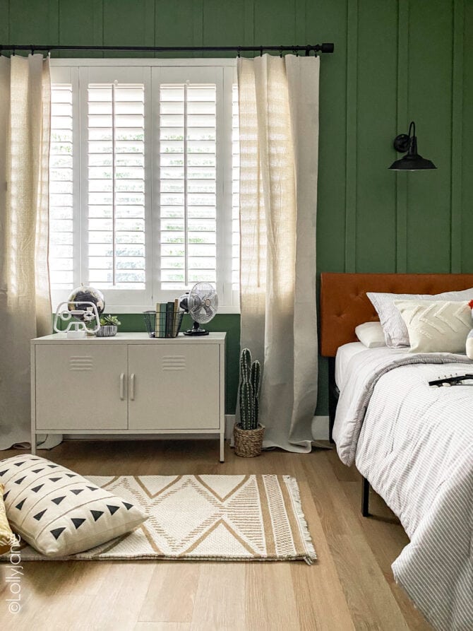 Walmart FTW! Cutest decor in this shared modern farmhouse style bedroom... and that wall treatment in the dreamiest shade of green is the perfect touch!