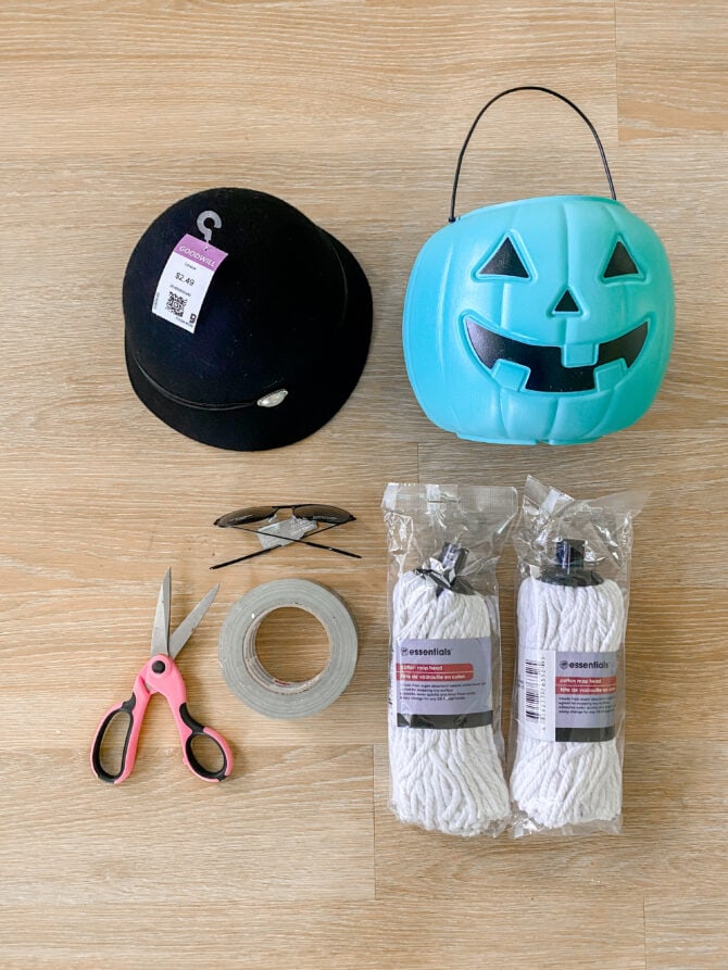 Cousin Itt Halloween Treat Bucket with Bernat Yarn and Addams Family Costume  - Repeat Crafter Me