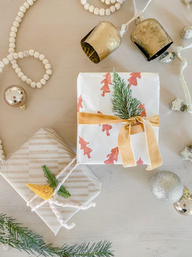 In a pinch for festive gift wrap? Grab a potato and some paint to make a festive design in no time... on the backside of ANY type of wrapping paper!