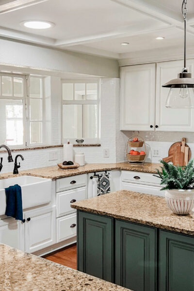 Hate your backsplash?! PAINT IT! Give your outdated tile a new look for just the cost of paint!