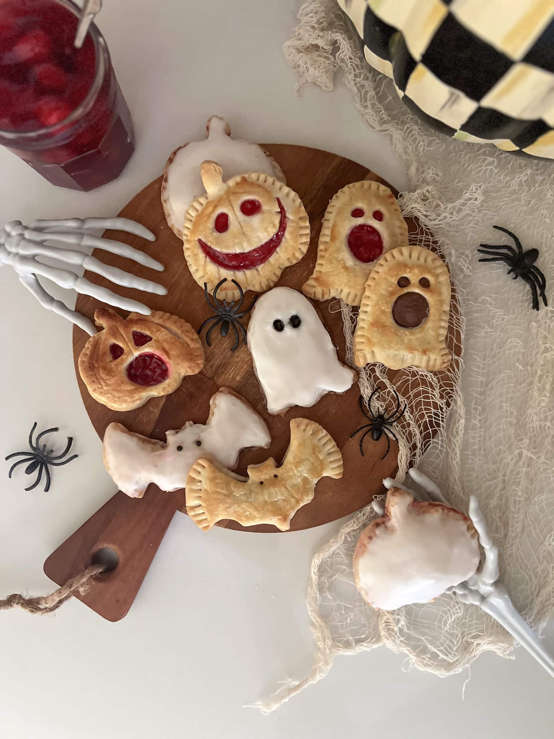 As easy as (Halloween) pie! Make these spooky hand pies in an hour, makes for a great breakfast treat or addition to a festive party! Add frosting for a "pop tart" style dessert!