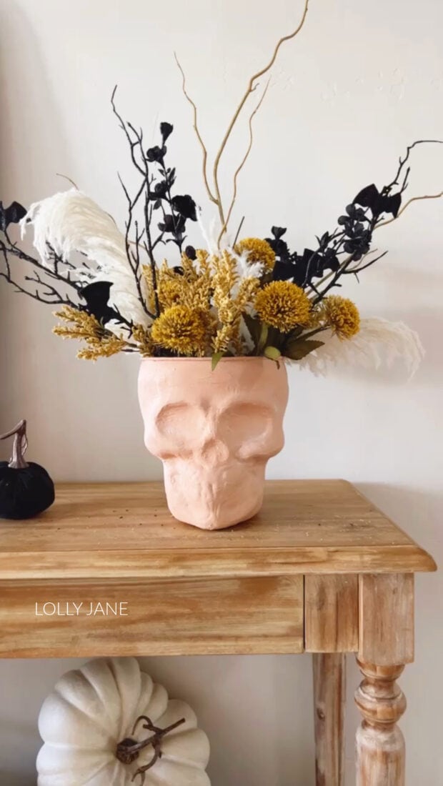 We're going to show you how to transform an acrylic skull into a terra cotta inspired vase, perfect for displaying Halloween florals and spooky picks from your local craft store. This DIY skull vase is the perfect blend of scary and chic, it's sure to be a conversation starter at your Halloween get togethers!