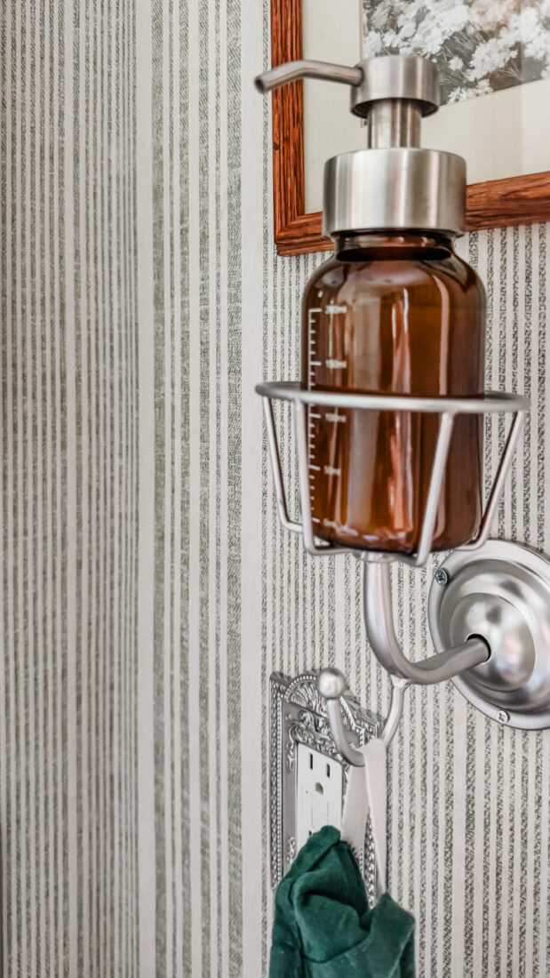Easy bathroom refresh using hook and vase vessel for liquid soap.