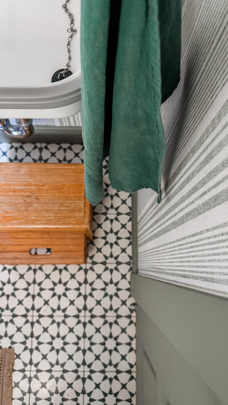 Small space bathroom makeover using decorative wall accessories.