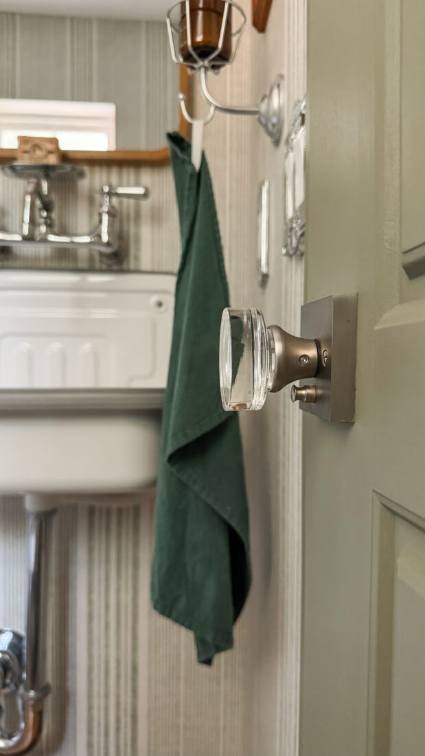 Bathroom mini makeover with hook and flower pot turned soap holder.