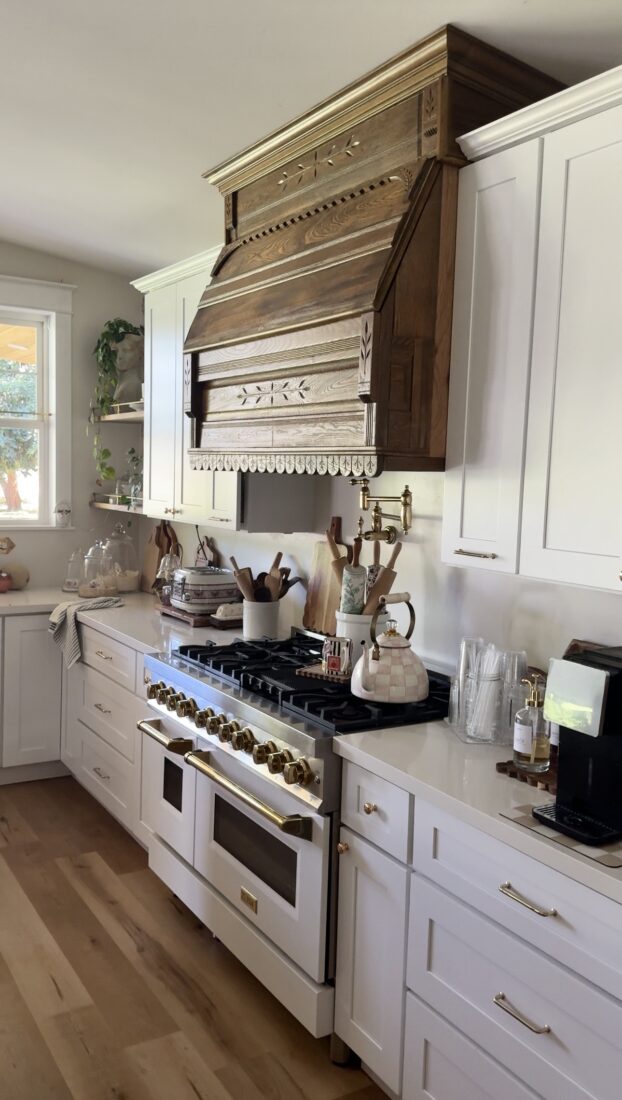 Side angle of custom antique range hood installation
