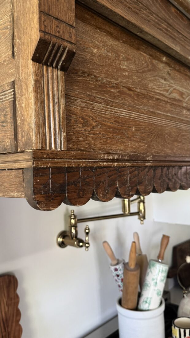 Learn how an antique headboard and footboard were transformed into a beautiful custom kitchen feature.
